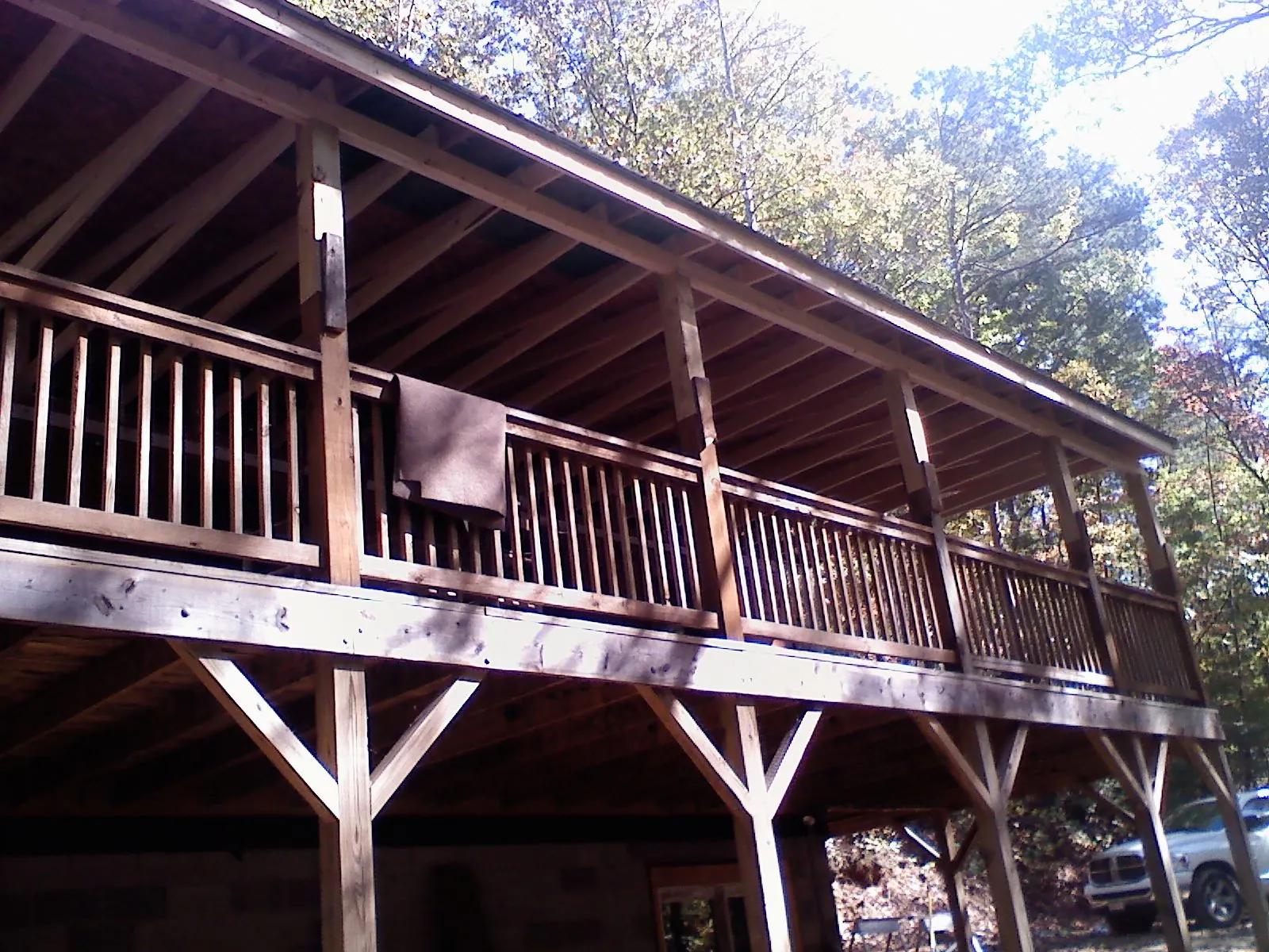 Timber framing under a new elevated porch and deck — Roof Leak Repair in Ridgewood by Roofing Brothers